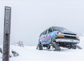 Winter sightseeing excursion on the Mt. Washington SnowCoach in Pinkham Notch