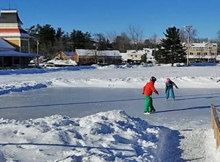 Ice skating in Schouler Park in North Conway Village, NH