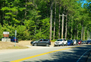 Dianas baths cars waiting in line to park